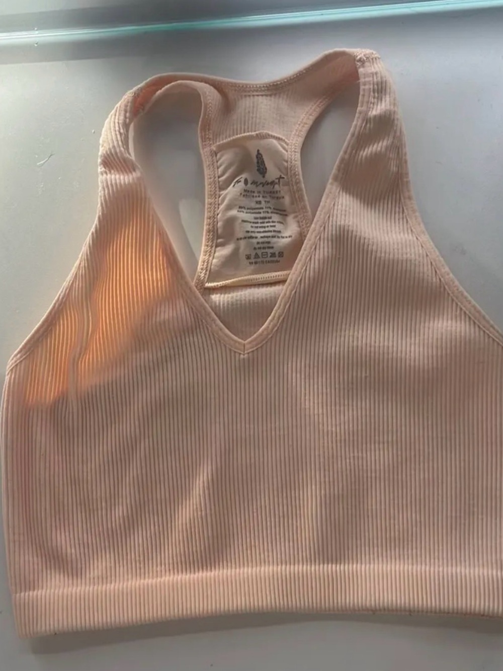 Free People Ribbed Racerback Tank Top in Light Peach